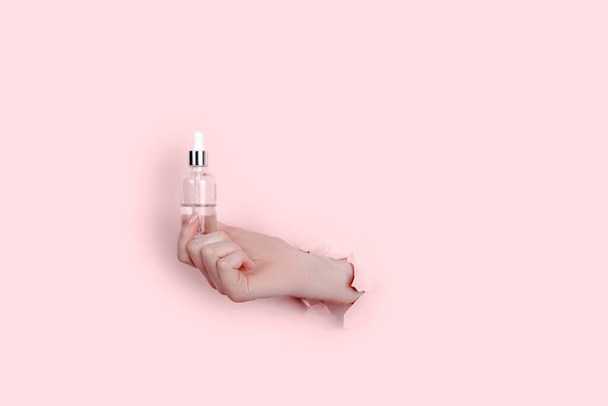 Eco Mineral oil in glass bottles with pipette dropper. Transparent hyaluronic serum gel and skin care concept. Top horizontal view - Φωτογραφία, εικόνα