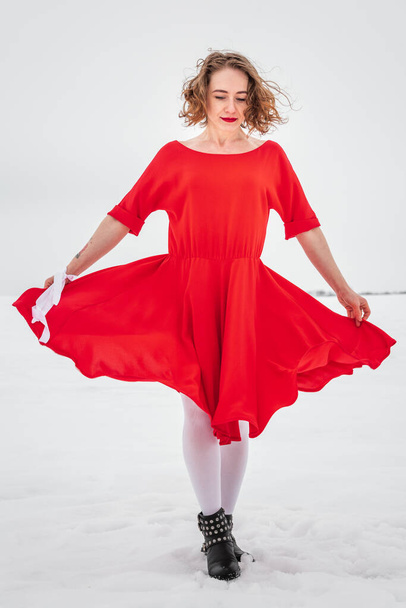 Beautiful woman in a red dress  - Φωτογραφία, εικόνα