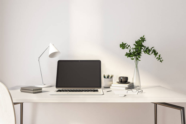 Черный экран ноутбука с копировальным пространством на белом столе домашнего офиса с растением в прозрачной вазе. 3D рендеринг, макет - Фото, изображение
