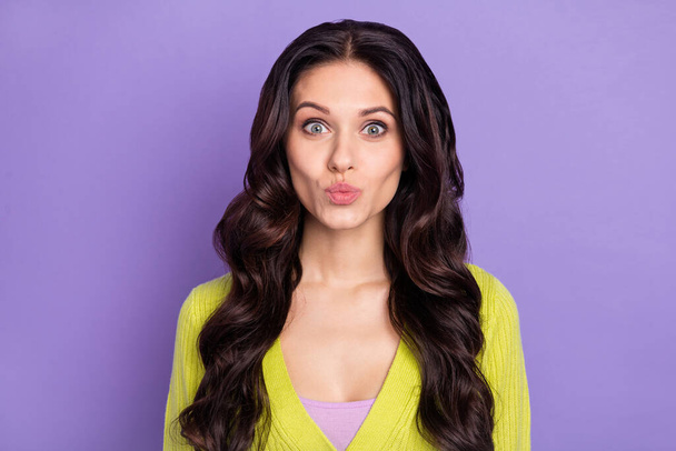 Photo portrait of pretty woman sending air kiss with pouted lips isolated on pastel purple color background - Foto, immagini