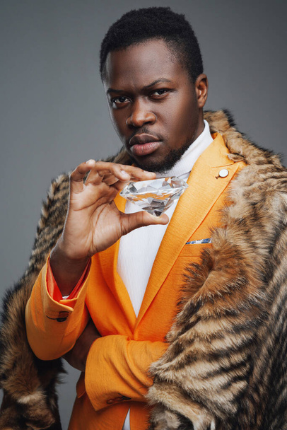 Rich black man with luxurious diamond and fur - Zdjęcie, obraz