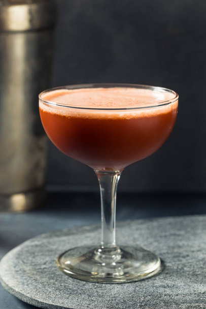 Boozy Refreshing Angostura Sour with Lime in a Coupe - Photo, Image