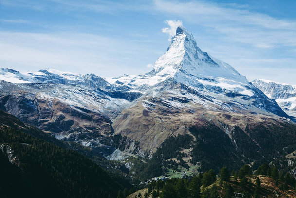 Scenic view of famous alpine peak Matterhorn near Swiss resort town of Zermatt - Фото, изображение