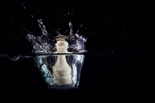 white chess pawn distorted in a beautiful water splash concept of business and board games - Photo, Image