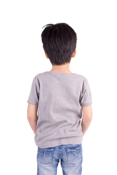 少年は、白い背景で隔離のグレーの t シャツを背面します。 - 写真・画像