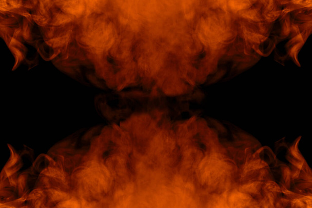 patrones mágicos de vapor de cigarrillo naranja brillante sobre un fondo oscuro nubes fantásticas textura para fumar concepto de diseño - Foto, Imagen