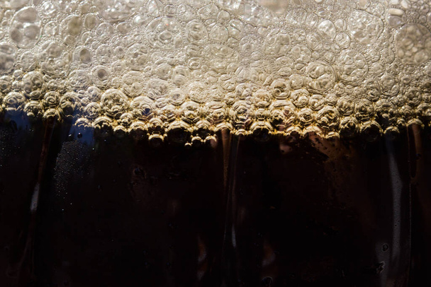 dark beer with bubbles close-up concept of alcohol - Foto, imagen