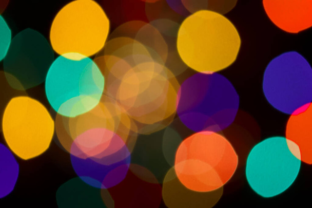 colorful new-year lights in blur festive abstraction close-up background for design - Photo, Image