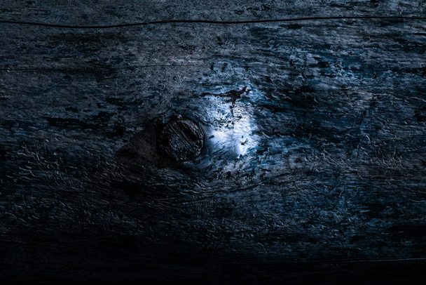 dark blue wood texture mysterious and with glitter in the middle natural background for design - Fotografie, Obrázek