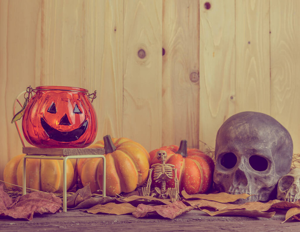 vintage tone image of Halloween pumpkin any vary ornament on wood table with Wooden background. - Photo, image