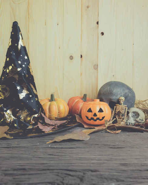 vintage tone image of Halloween pumpkin any vary ornament on wood table with Wooden background. - Photo, Image
