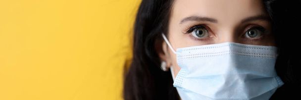Portrait of business woman wearing medical protective face mask - Photo, Image