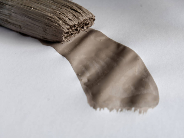 close-up of a brush full of beige color - Photo, Image
