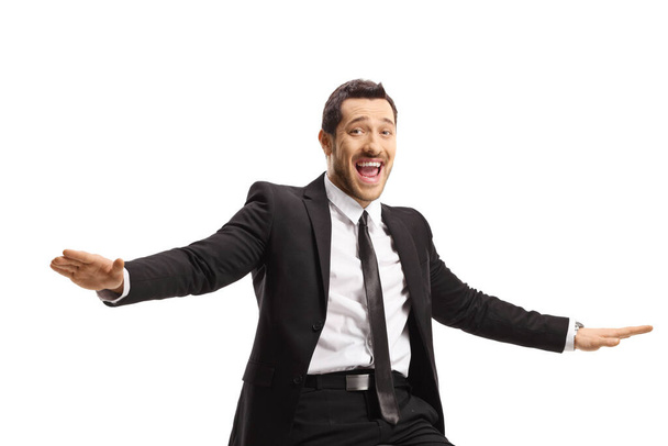 Excited businessman gesturing with hands and smiling at the camera isolated on white background - Fotografie, Obrázek