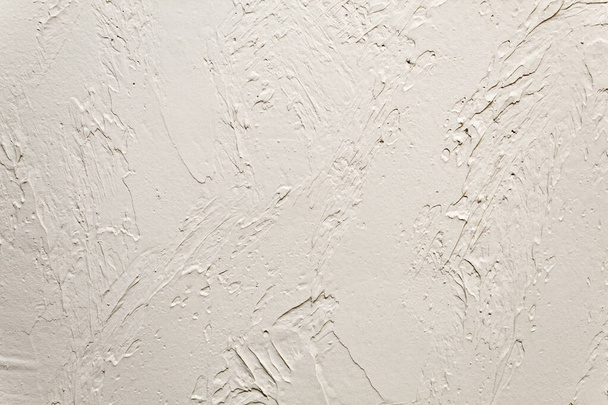 muur bedekt met grove klei. abstracte achtergrond - Foto, afbeelding