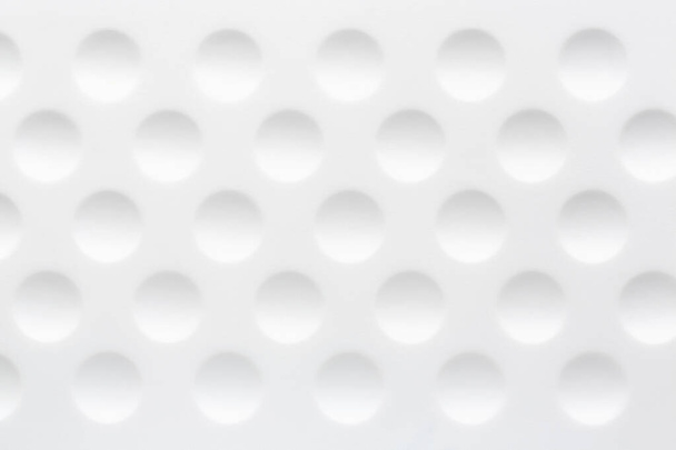 white plastic background with circles, light from above - Photo, image