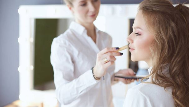 beautiful young model woman getting fashion make-up - 写真・画像