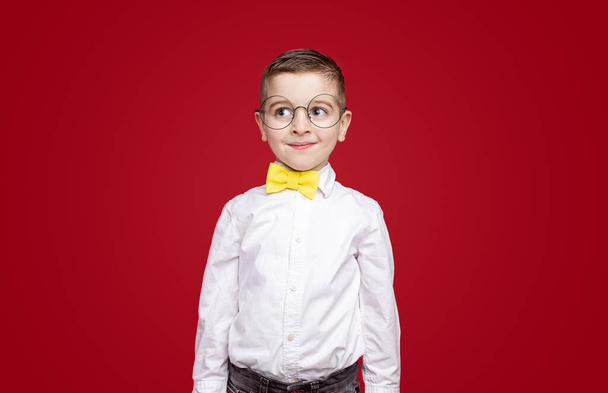 Nerd boy in bow tie and glasses - Photo, image