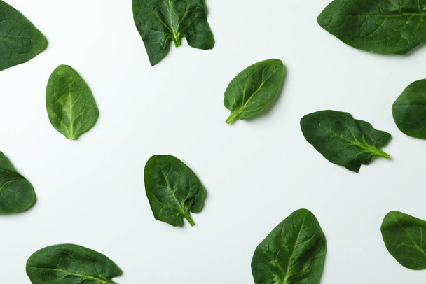 Fresh raw spinach leaves on white background - Foto, Imagem