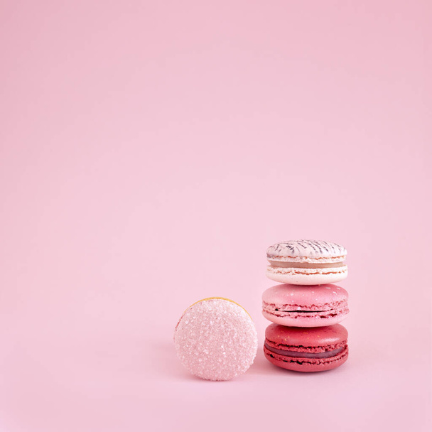 delicious sweet french meringue on pink background, free space, valentine's day gift - Foto, immagini