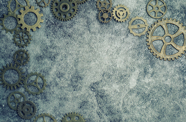 Steampunk background with different sized cogs and gears. - Fotoğraf, Görsel