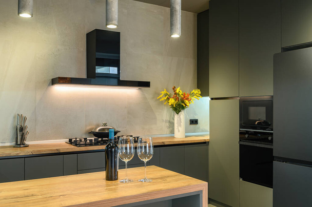 Modern large luxury dark gray kitchen closeup - Photo, Image