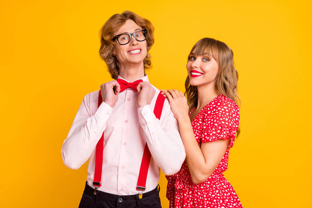 Photo portrait of funny couple preparing to date on valentines day smiling wearing stylish outfits isolated vivid yellow color background - Фото, зображення