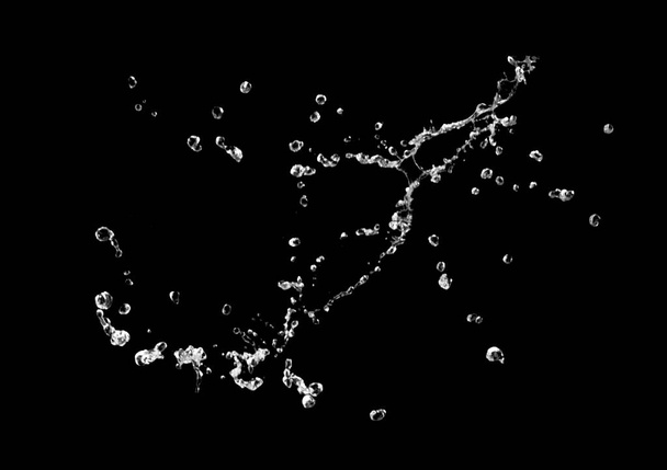 πιτσιλίσματα νερού σε μαύρο φόντο - Φωτογραφία, εικόνα