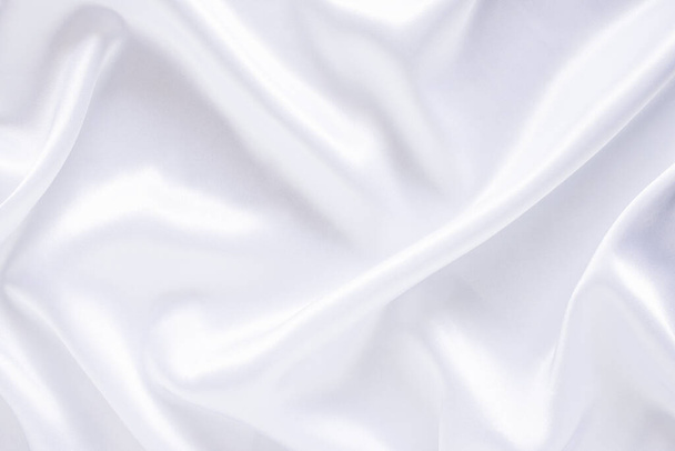 Белый фон ткани абстрактный с мягкими волнами. - Фото, изображение