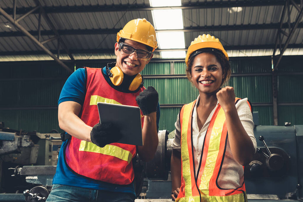 Two skillful factory engineer or worker happy portrait looking at camera - Photo, Image