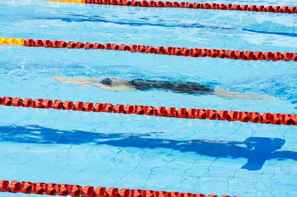 Swimmer swimming in a pool - Foto, imagen