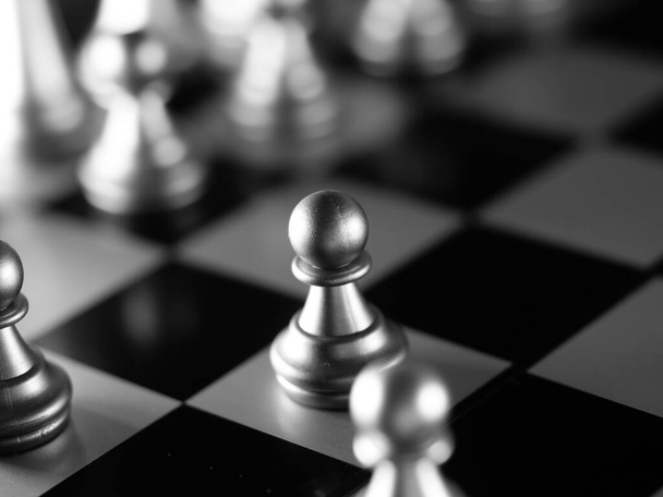 A grayscale closeup shot of chess figures - Photo, image