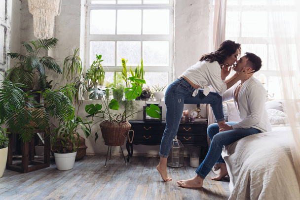 young couple spending time in their beautiful countryside house - Photo, Image