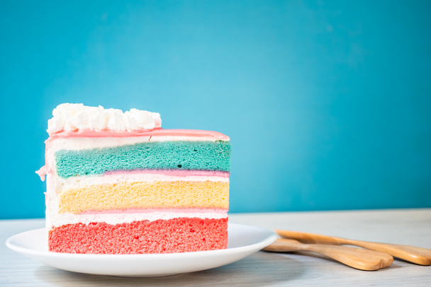 layer rainbow cake on blue background - Fotografie, Obrázek