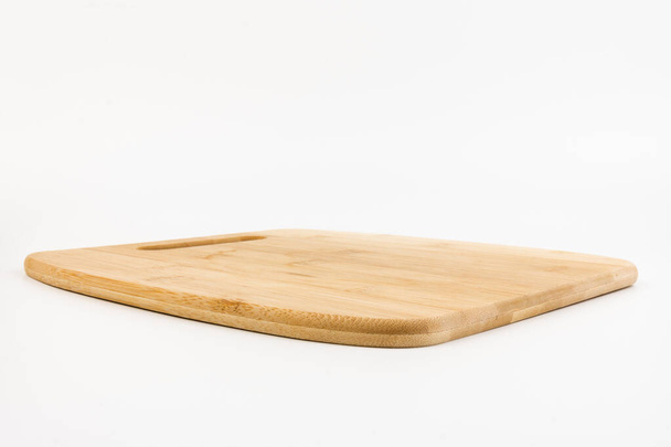 Cutting Board on a white background. Chopping boards made from natural bamboo.Texture. - Photo, Image