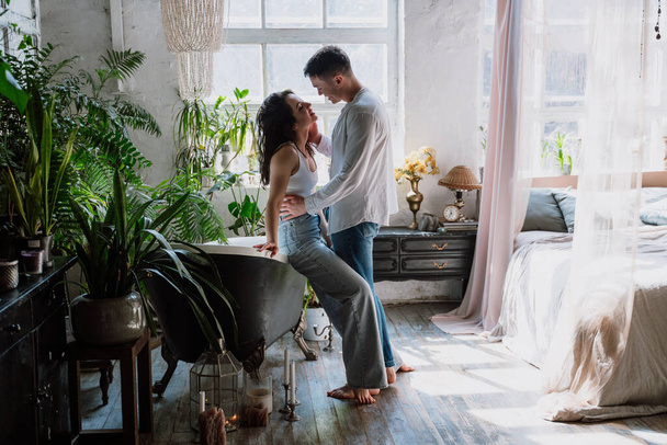 young couple spending time in their beautiful countryside house. Romantic lifestyle moments - Foto, Bild