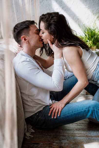 young couple spending time in their beautiful countryside house. Romantic lifestyle moments - Fotografie, Obrázek