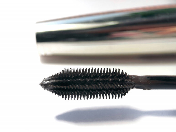 Close-up of mascara brush on white background.  Beauty concept. - Photo, Image