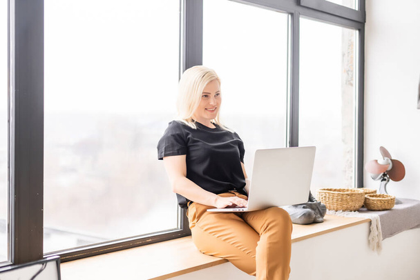 Hipster woman use Laptop huge Loft Studio. Student Researching Process Work. Young Business Woman Working Creative Startup modern Office. Analyze market stock, new strategy - Φωτογραφία, εικόνα