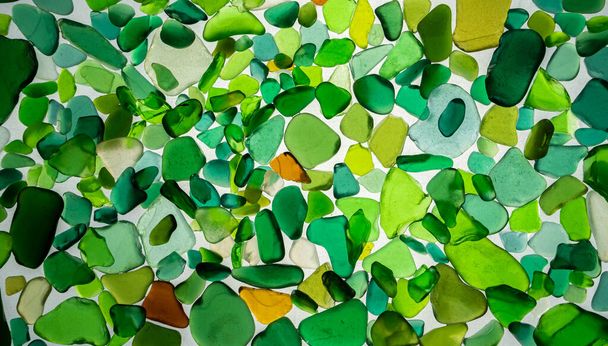Summer background from sea glass top view. Broken glass from the ocean. Sea pattern. Oceanic mosaic. Natural colors of blue, green, white found on the coast. - Foto, Imagem