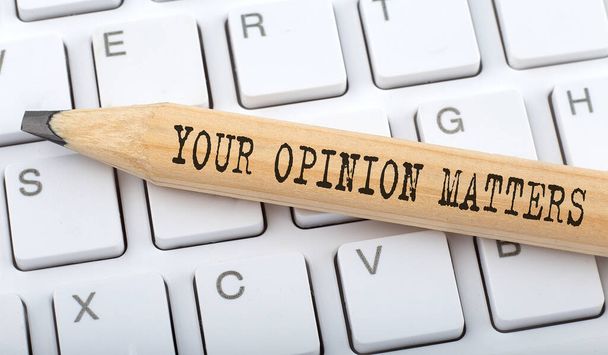 Text YOUR OPINION MATTERS on wooden pencil on white keyboard. Business - Photo, Image