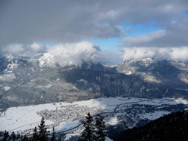 Farchant with mountain panorama in Bavarian Alps, in wintertime - Photo, Image
