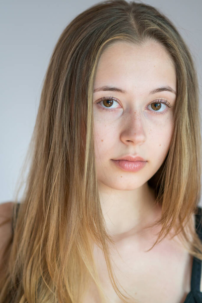 Beautiful teen girl, intense close-up portrait - Foto, Imagen