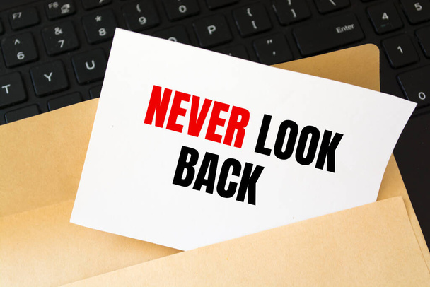 Text sign showing NEVER LOOK BACK - Photo, Image