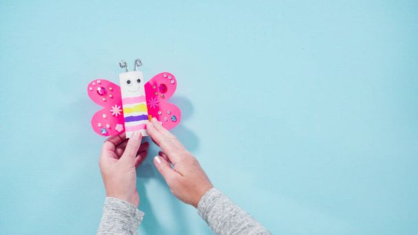 Flat lay. Papercraft project. Colorful bugs made out of empty toilet rolls. - Photo, Image