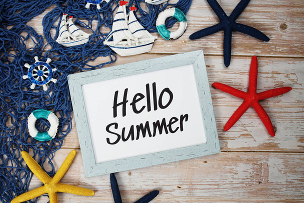 Hello Summer text with summer decoration on wooden background - Φωτογραφία, εικόνα