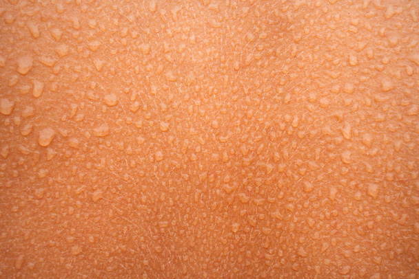 Gotas de agua o sudor en la piel humana. Piel húmeda - Foto, Imagen