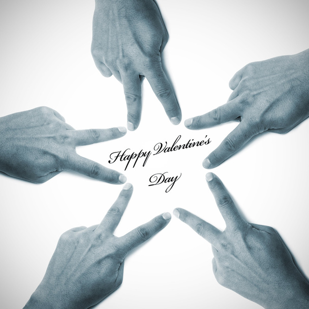 Ημέρα του ευτυχούς βαλεντίνου γραμμένο σε λευκό φόντο με τα χέρια, αντλώντας ένα αστέρι - Φωτογραφία, εικόνα