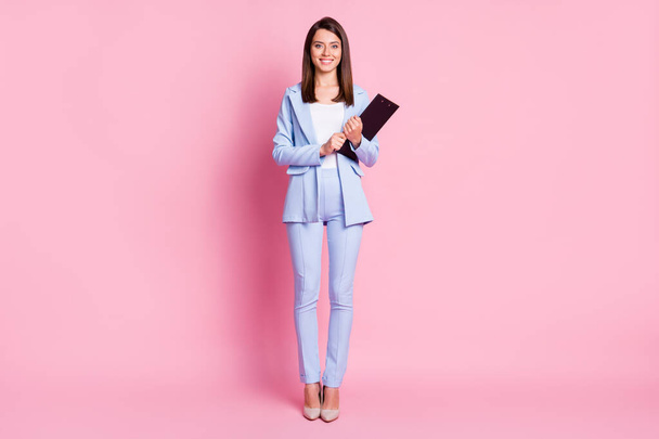 Full size photo of young beautiful smiling cheerful happy businesswoman hold checklist isolated on pink color background - Fotoğraf, Görsel