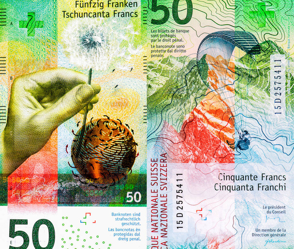 Bal kéz egy pitypangot tart, selymes, áramló pappival, amit a szél visz ki. Portré Svájcból 50 frank 2015 Hibrid polimer bankjegyek. - Fotó, kép
